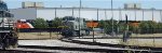 A primered BNSF 3283 (ES44ACH Tier 4 Credit) with CN 3325 (AC44C6M), BNSF 3667 and BNSF 3668 (ET44ACH's) in the Background..